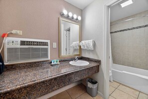Shower, hair dryer, towels, shampoo