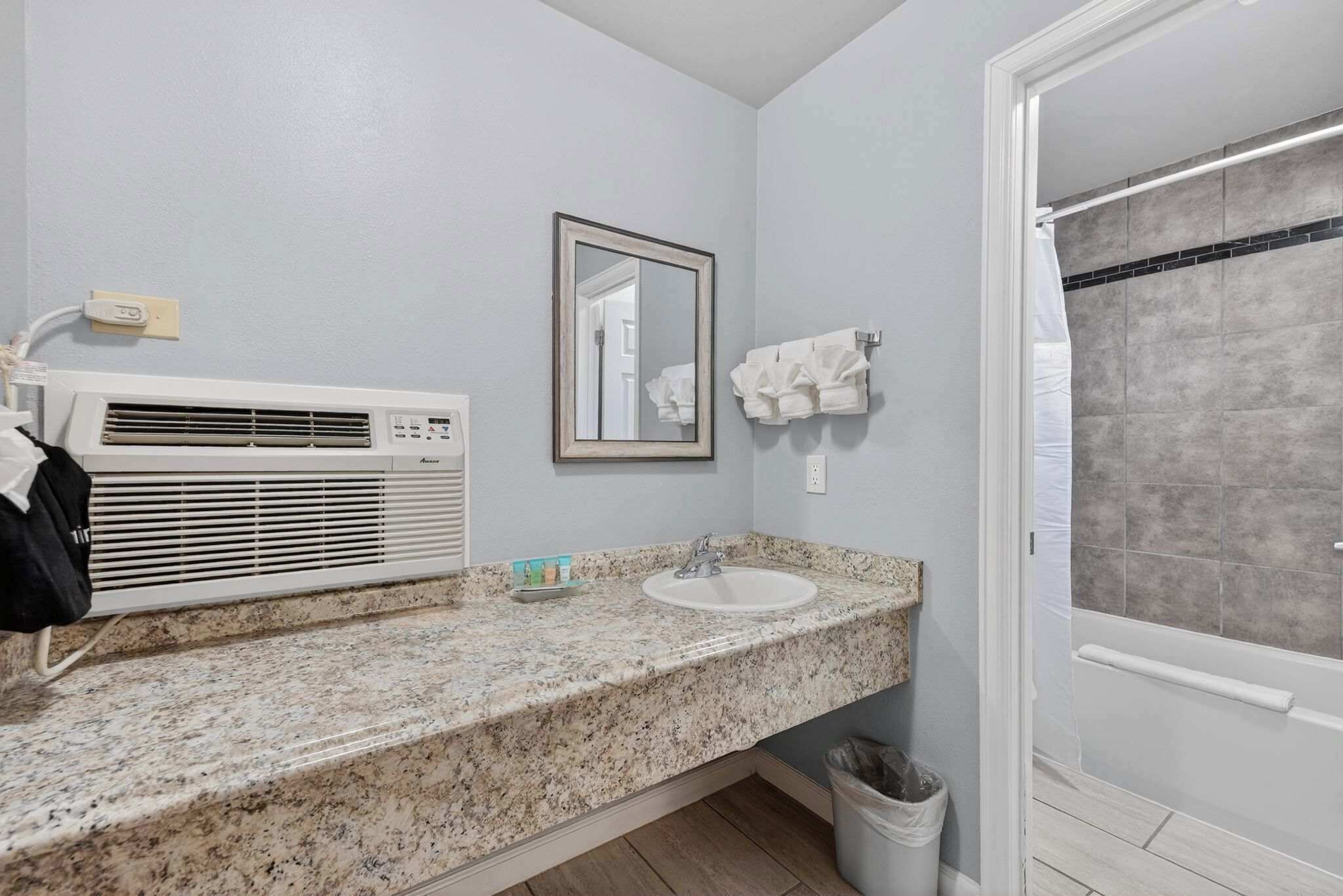 Shower, hair dryer, towels, shampoo