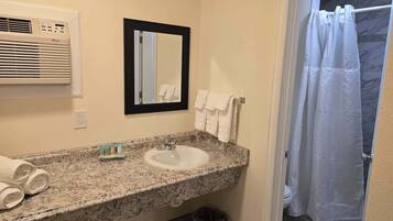 Shower, hair dryer, shampoo