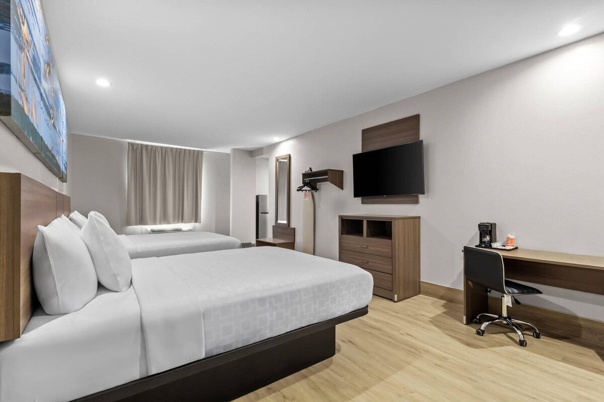 Standard Room, 2 Queen Beds, Non Smoking, Kitchenette | Premium bedding, laptop workspace, blackout drapes, soundproofing