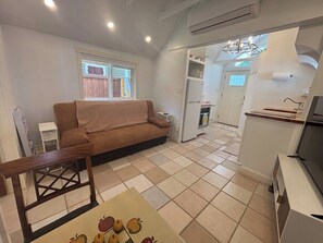 Living area - Persimmon Cottage is a bright clean petite modern 1 BR (Bloomington)