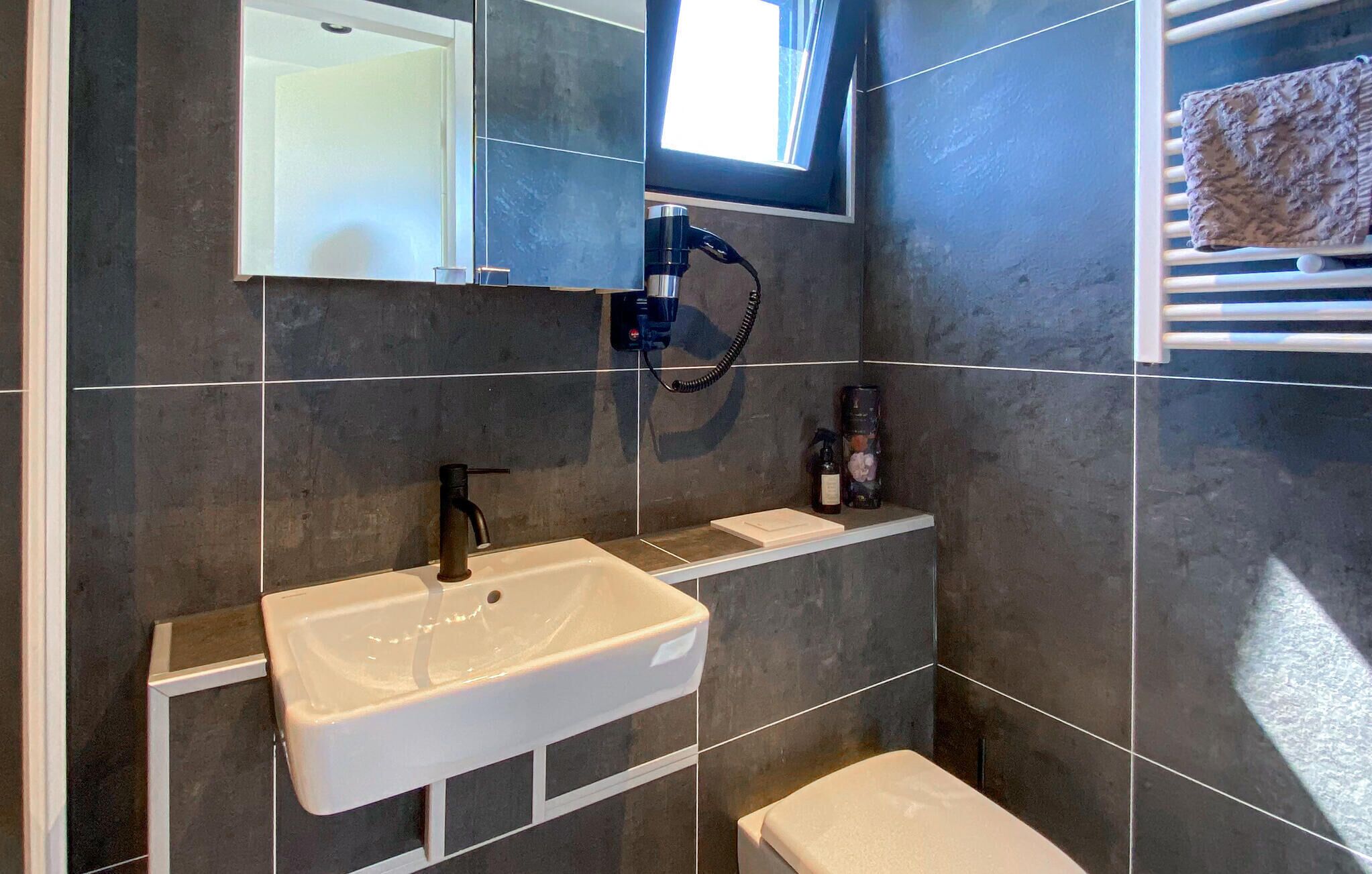 Een douche, een haardroger