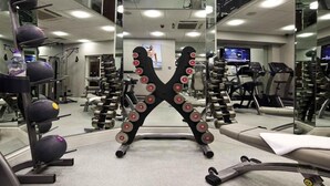 A gym with weightlifting equipment, treadmills, and exercise machines. - Nottingham City Centre Hotel Double Room (Nottingham)