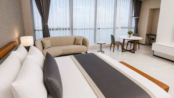 In-room safe, desk, laptop workspace, blackout curtains