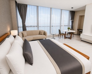 In-room safe, desk, laptop workspace, blackout curtains