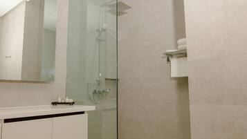Designer toiletries, towels, soap, shampoo