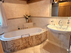 Shower, hair dryer, towels, toilet paper