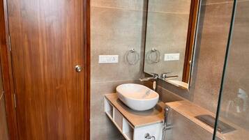 Shower, free toiletries, hair dryer, towels