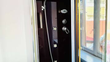 Shower, hair dryer, towels