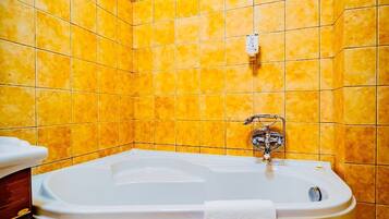 Shower, hair dryer, towels, shampoo