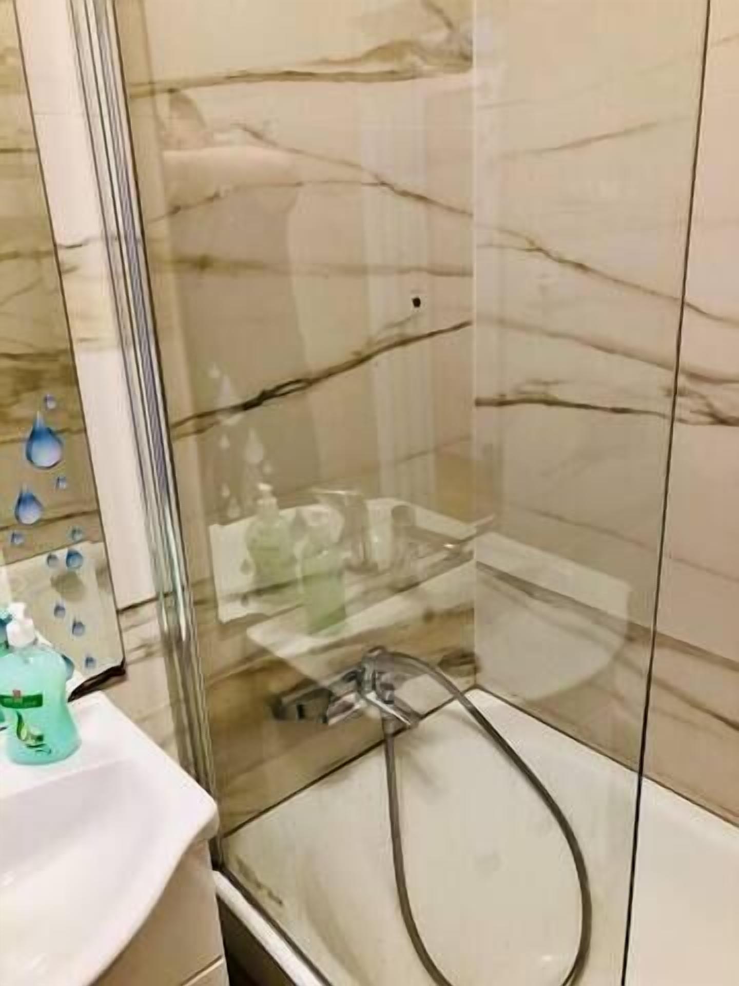 Shower, hair dryer, towels, shampoo