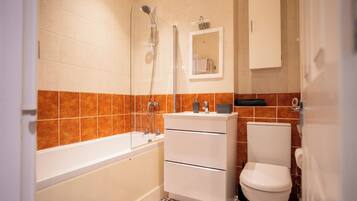 Hair dryer, towels, soap, toilet paper