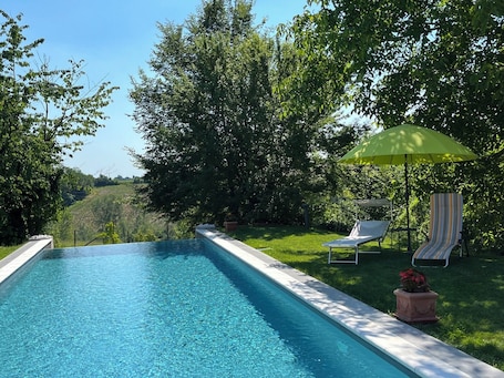 Seasonal outdoor pool, open 9:30 AM to 7:00 PM, pool umbrellas. Noi Due B&B nel Monferrato