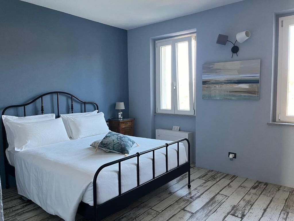 Quarto casal conforto, para não fumantes, vista para o pátio | Wi-Fi de cortesia