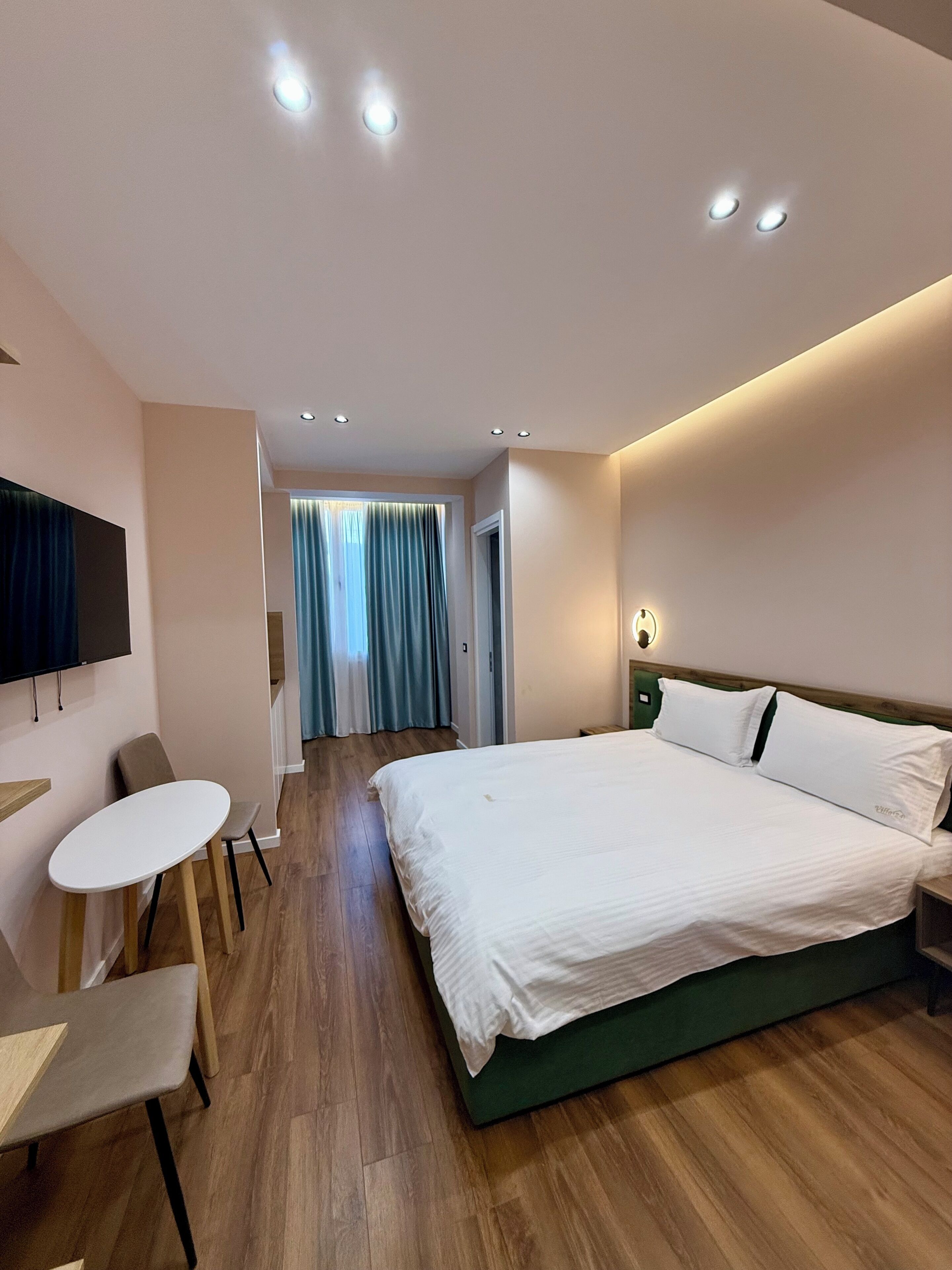 Chambre Double Familiale, vue ville | Coffres-forts dans les chambres, Wi-Fi gratuit