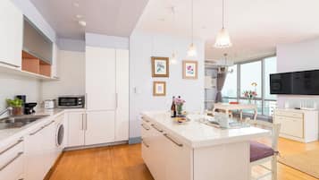 Fridge, microwave, stovetop, coffee/tea maker