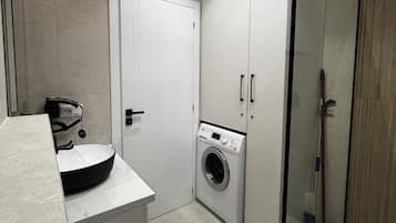 Hair dryer, towels, soap, toilet paper
