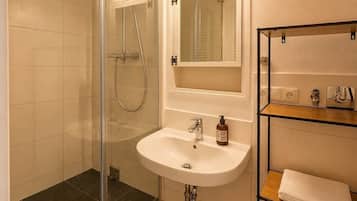 Shower, hair dryer, shampoo