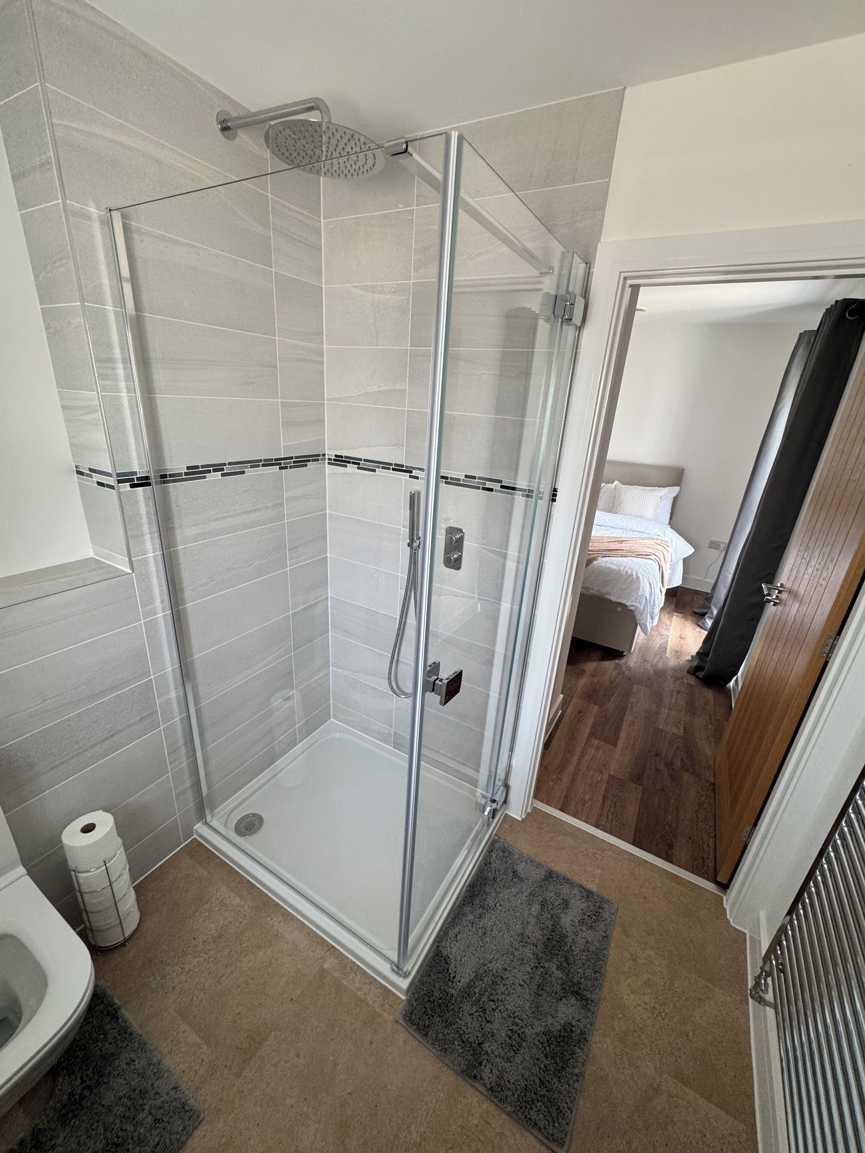 Shower, towels, toilet paper