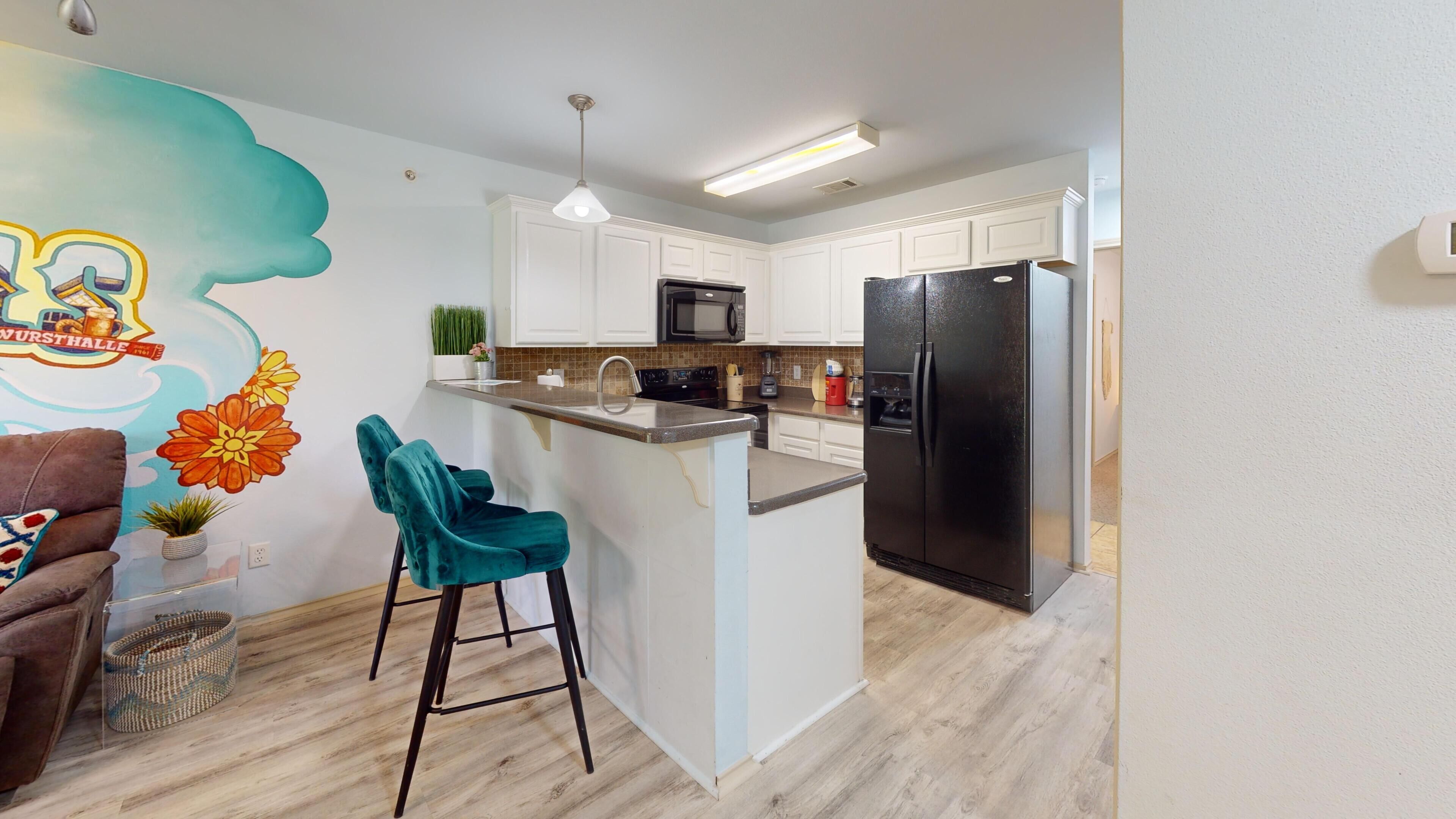 Coffee/tea maker, fridge, microwave, oven