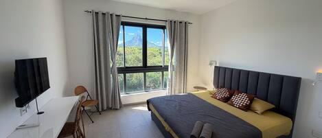 1 habitación, tabla de planchar con plancha, wifi y ropa de cama