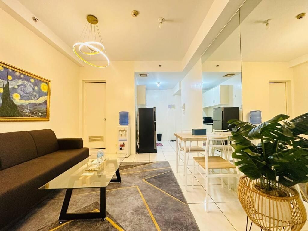 Căn hộ, 1 giường cỡ queen, phòng tắm riêng, quang cảnh thành phố | Khu phòng khách
