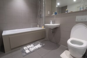 Hair dryer, towels, soap, toilet paper