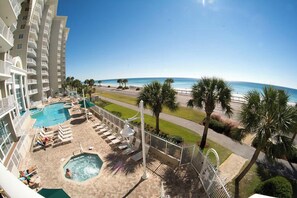 A hotel pool area with a hot tub, lounge chairs, and a view of the beach. - 🐬Indoor/Outdoor Pools🔆-Fitness Center~Walk to Beach- Vista Esmeralda🔆 (Miramar Beach)