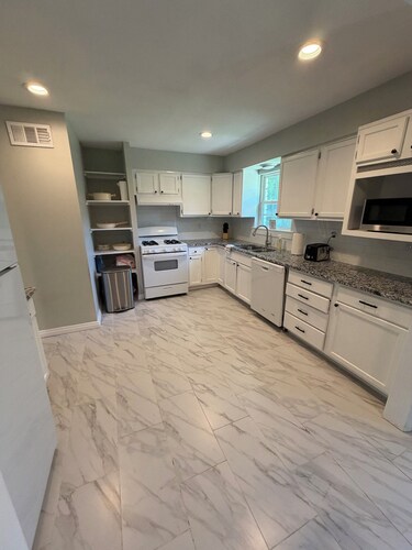 New and clean 3BR 1.5 bath with king bed and 2 queens. 5 minutes from anything.