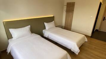 Basic Twin Room, Courtyard View | Laptop workspace, free WiFi