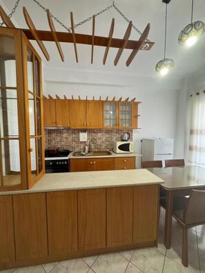 Fridge, dining tables