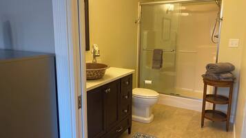 Family Apartment, Garden View | Bathroom | Shower, hair dryer, towels