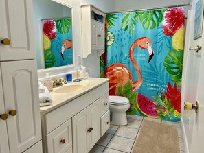 Shower, hair dryer, towels, soap