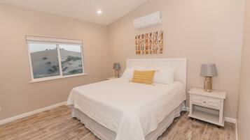 Iron/ironing board, travel crib, free WiFi, bed sheets