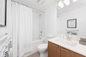 Hair dryer, towels, soap, toilet paper