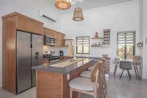 Fridge, microwave, coffee/tea maker, toaster - A/C in Living Room • Luxury • Guest House. (Sosúa)