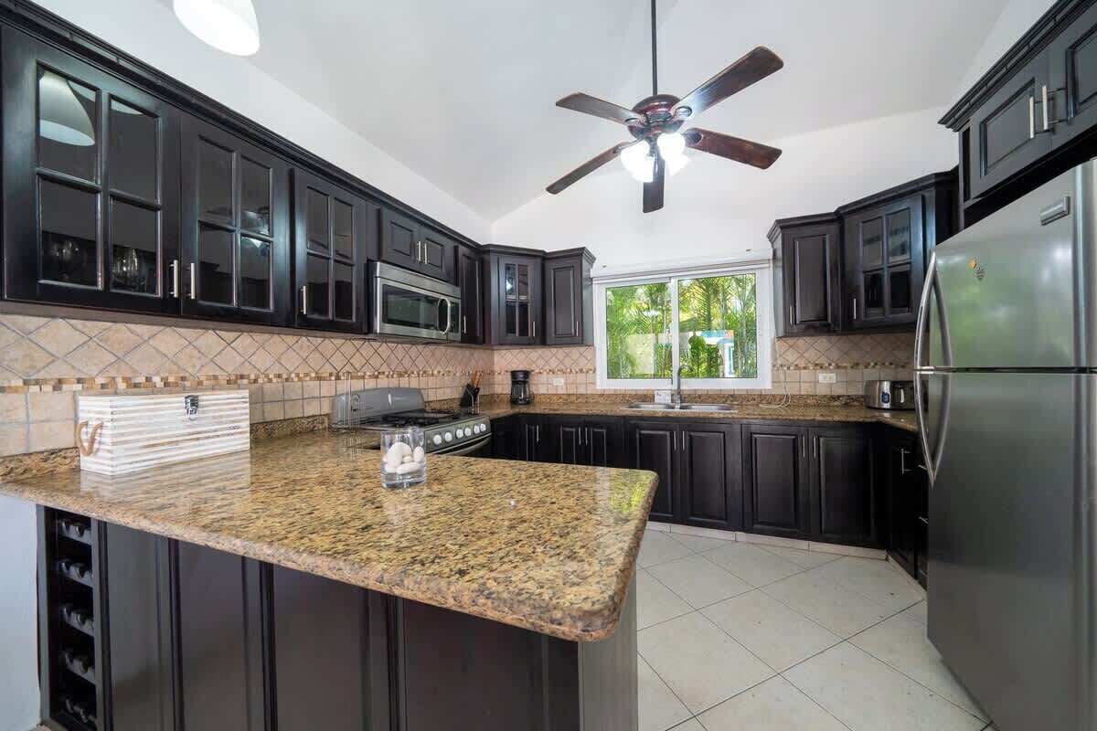 Fridge, coffee/tea maker, cookware/dishes/utensils