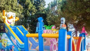 An inflatable play structure with a slide and various colorful elements. - Relaxing Premium Family Lounge (Brtonigla)