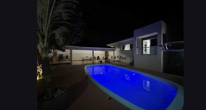 House near Rafain Convention Center, Paraguay, Iguazu Falls and Argentina.