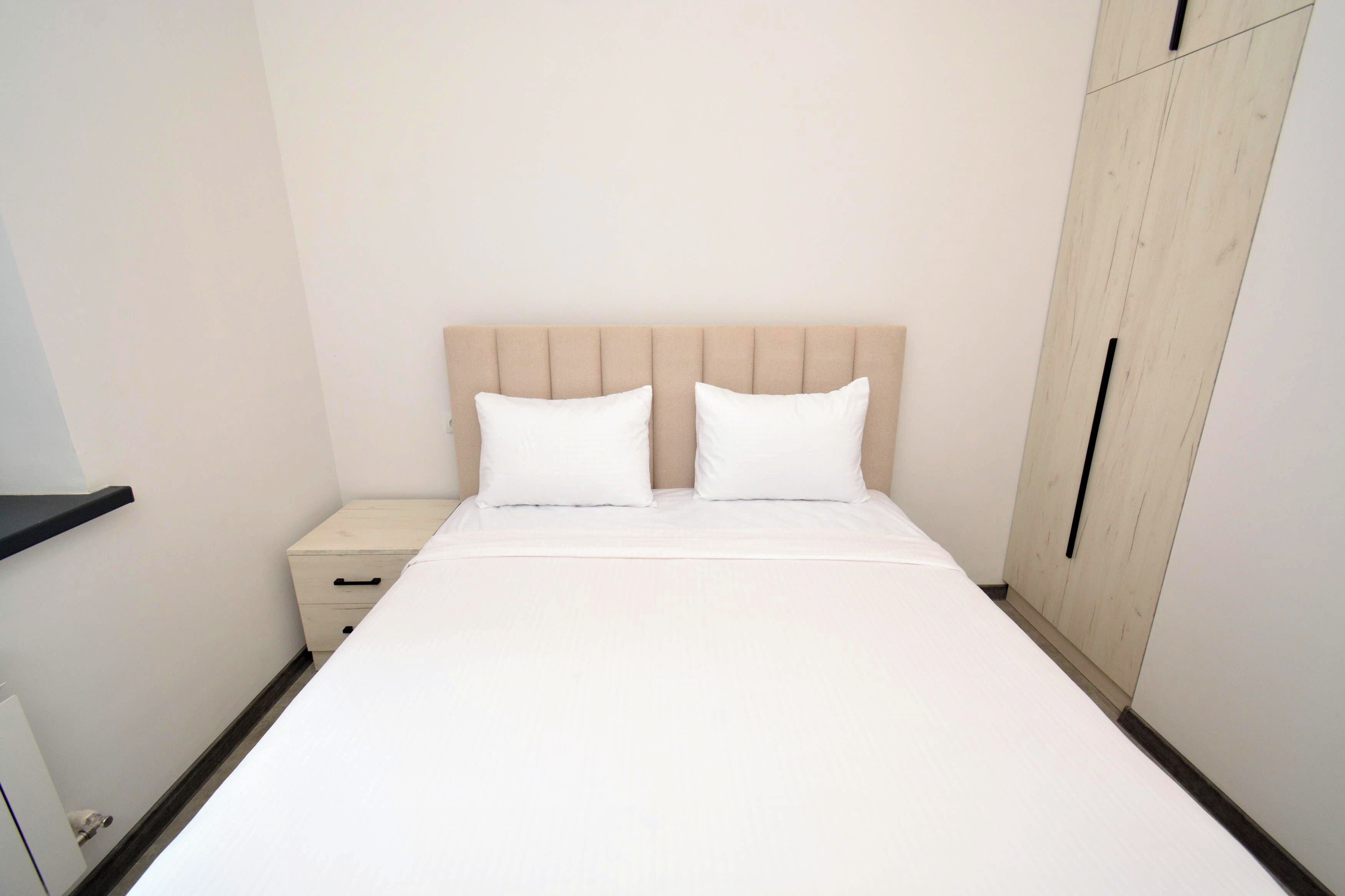 Premium bedding, blackout drapes, iron/ironing board, free WiFi