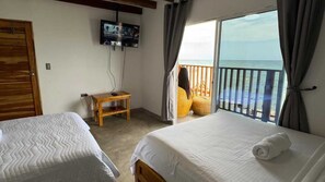 Quadruple Room, Balcony, Beach View | Free WiFi - w cabañas beach (Bolívar)