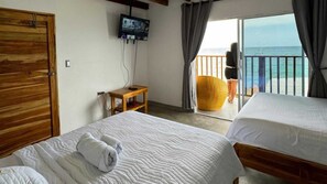 Quadruple Room, Balcony, Beach View | Free WiFi - w cabañas beach (Bolívar)