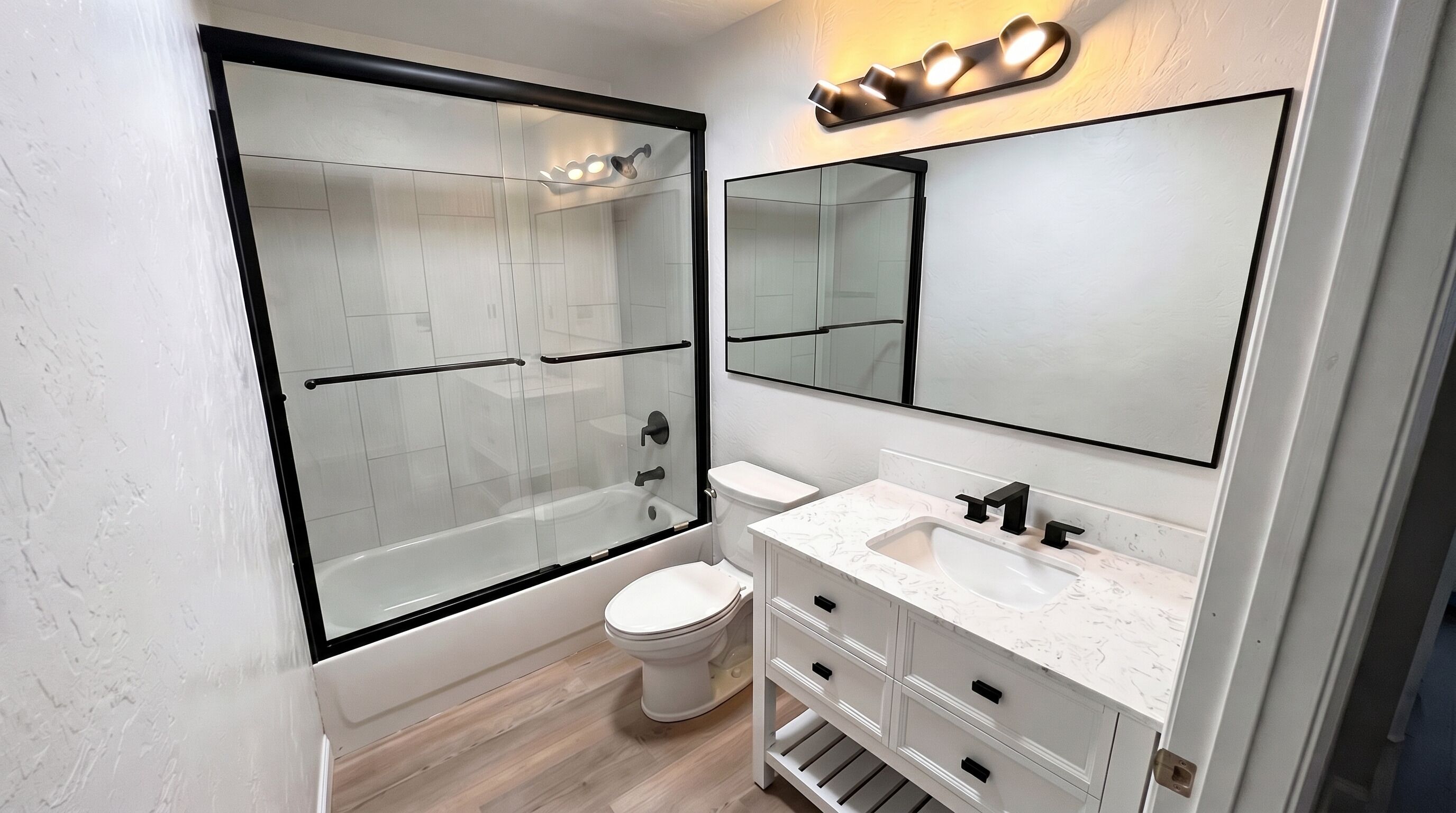 Combined shower/bathtub, hair dryer, towels, soap