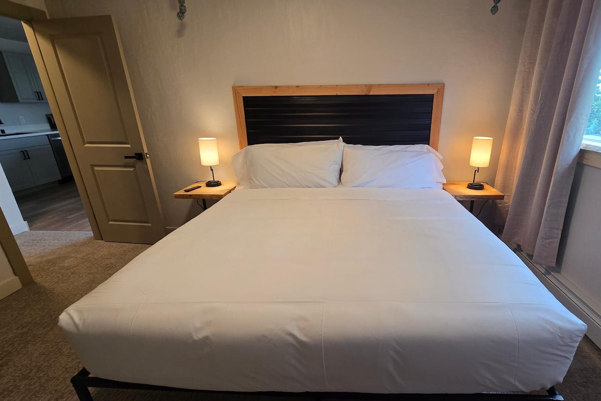 Deluxe Suite, 1 King Bed with Sofa bed, Non Smoking | Desk, laptop workspace, blackout drapes, iron/ironing board (on request)