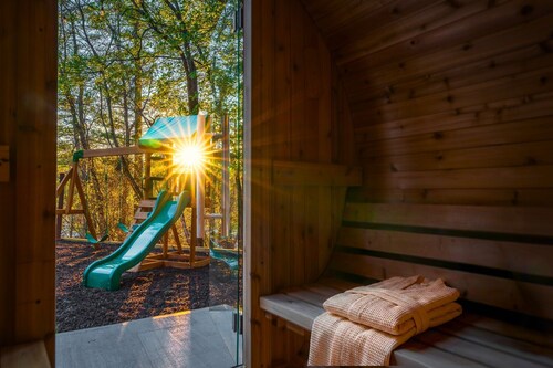 Sleeps 20 • 15 Mins to DT AVL • Sauna • Hot Tub!