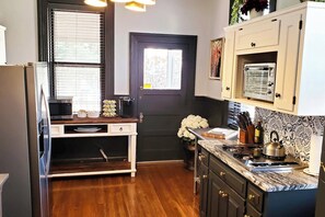 Fridge, microwave, stovetop, coffee/tea maker