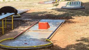 A playground with a seesaw, a red block, and a yellow and red track. - Premium Family Escape in Umag (Brtonigla)