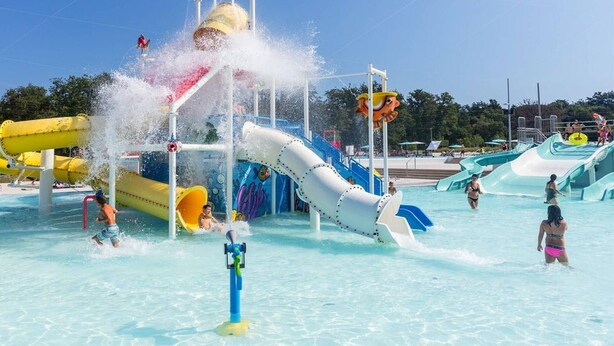 A water park with multiple slides and water features. - Premium Family Escape in Umag (Brtonigla)