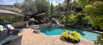 Resort style 4 bedroom home in Hillcrest gated community with pool and spa