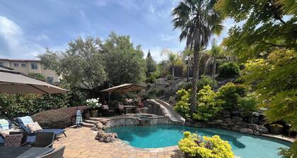 Resort style 4 bedroom home in Hillcrest gated community with pool and spa